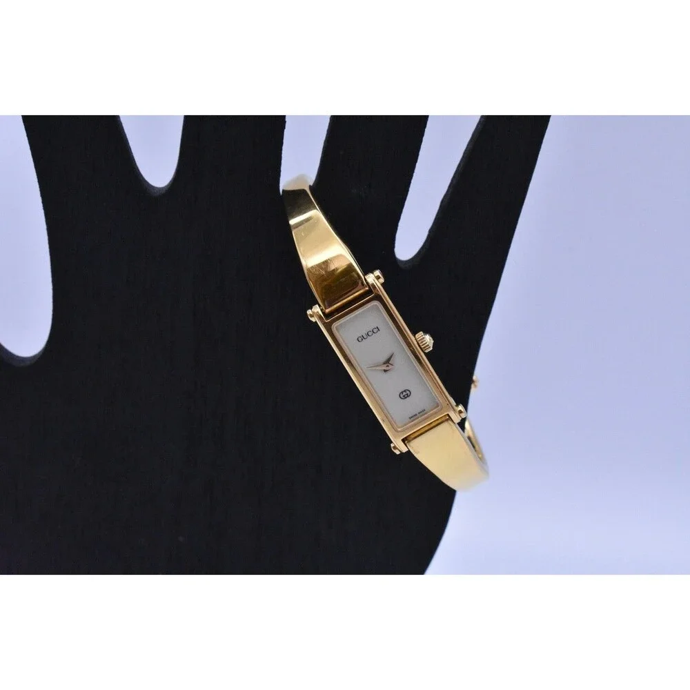 Vintage Gucci 1500L Ladies Gold Tone Bangle Watch Cream Dial Swiss Quartz